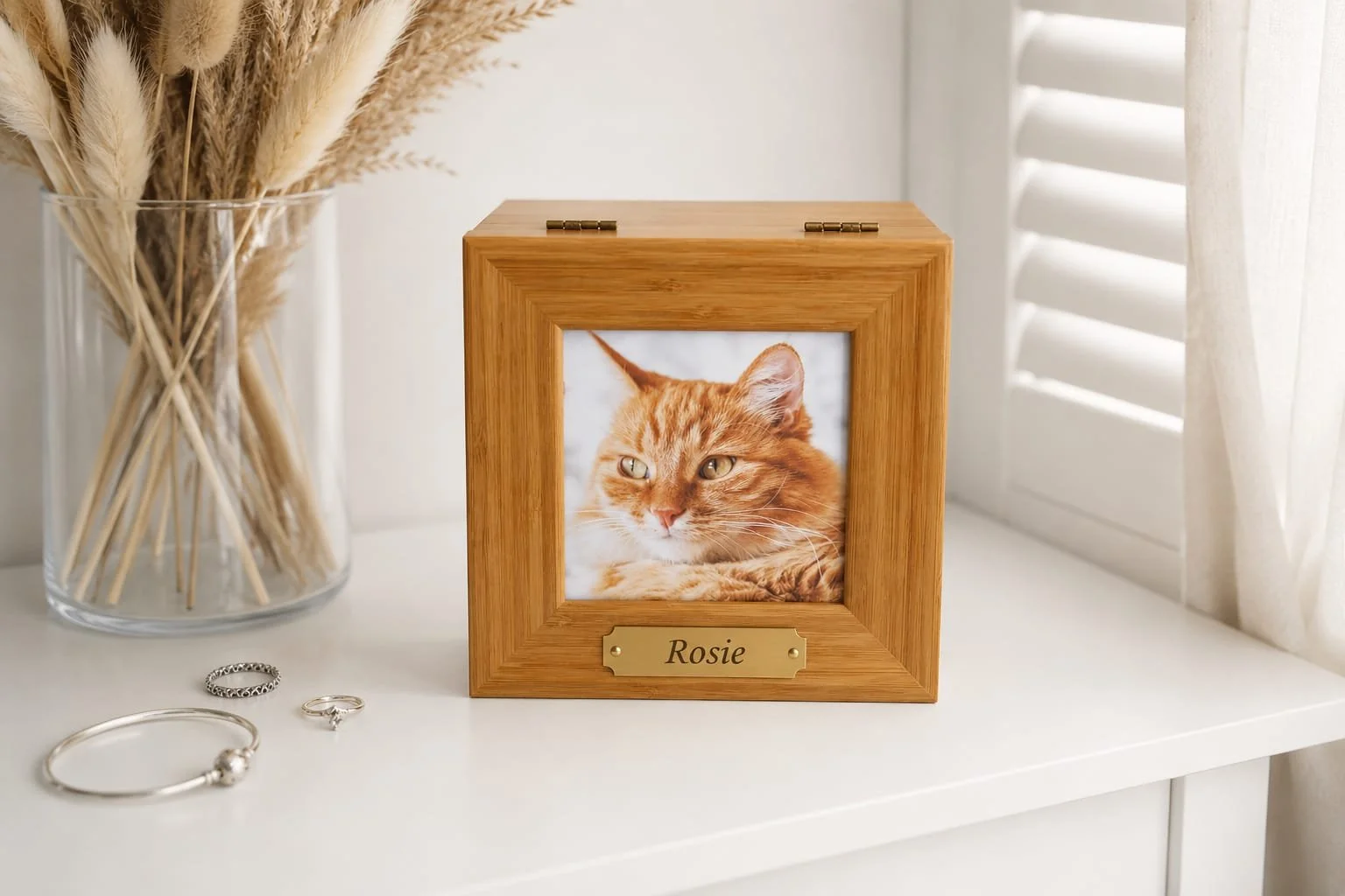 A personalised Remembrance Box, with an engraved wooden heart and keepsake vials